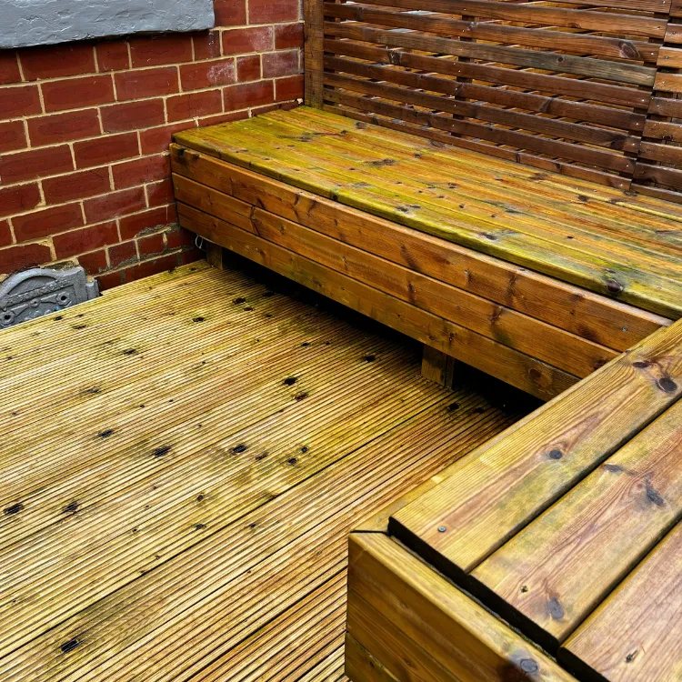 The same decking and bench after pressure washing