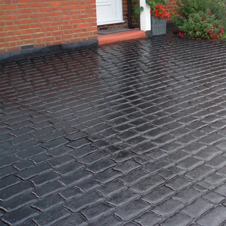 The same imprinted concrete after recolouring in charcoal
