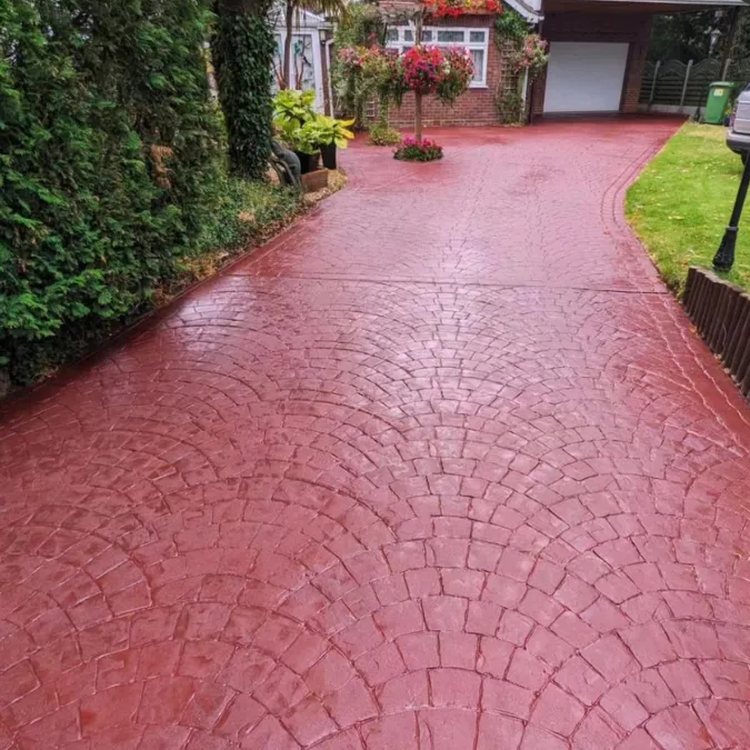 Red imprinted concrete, recoloured and sealed, by Hydra Restore