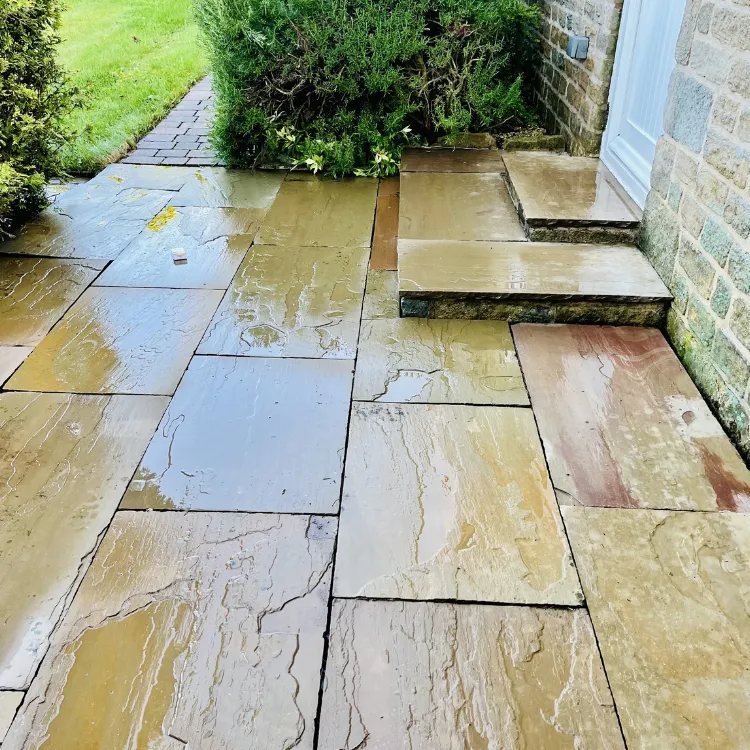 The same sandstone path and steps after pressure washing