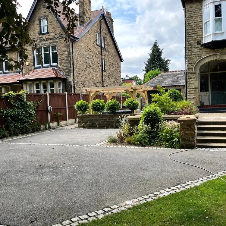 Tarmac driveway in Roundhay before restoration, faded grey