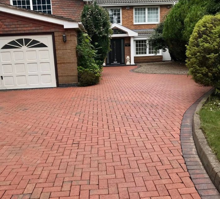 The same block paved driveway after pressure washing by Hydra Restore